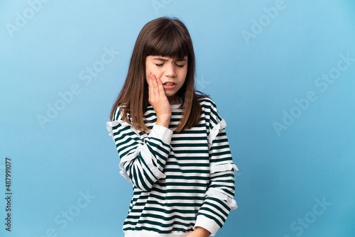 Little girl over isolated background with toothache