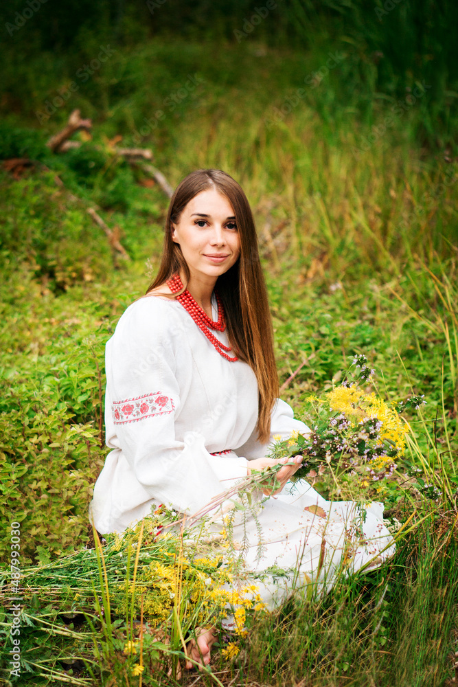a beautiful young girl in the national Ukrainian dress. ukraine against war. Pray for Ukraine a beautiful young girl in the national Ukrainian dress. ukraine against war. Pray for Ukraine