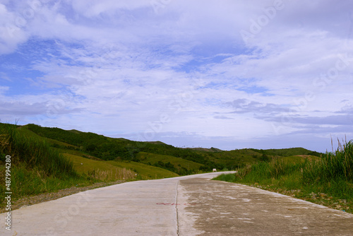 Long road in the countryside. Cabaliwan Peak, Romblon, Philippines