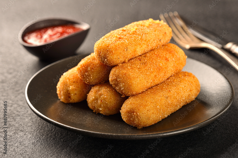 Homemade fried POTATO CROQUETTES and ketchup Homemade fried POTATO CROQUETTES and ketchup