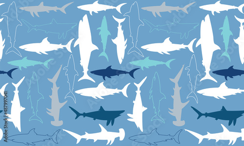 This shark-themed seamless vector pattern would make a great background or surface design.
