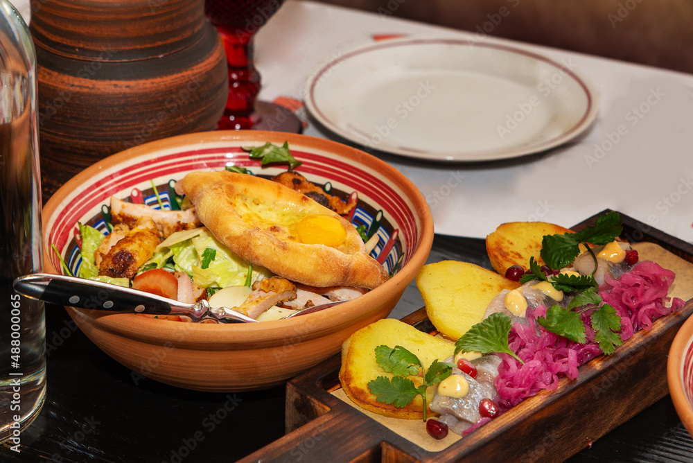 Georgian national traditional food. Caucasian kitchen. Khachapuri. Georgian national traditional food. Caucasian kitchen. Khachapuri.