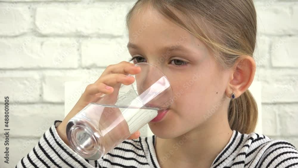 Kid Drinking Water, Child Drinks Fresh Water from Glass, Thirsty Blonde Girl in Kitchen, Children Healthcare Kid Drinking Water, Child Drinks Fresh Water from Glass, Thirsty Blonde Girl in Kitchen, Children Healthcare