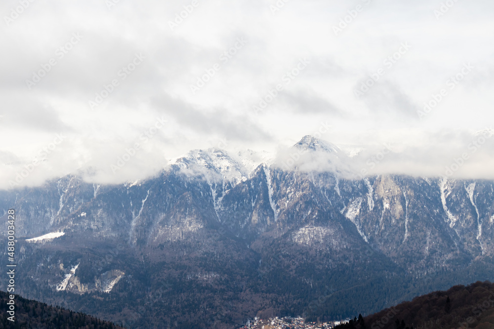 Snow covered mountain peak winter panorama landscape