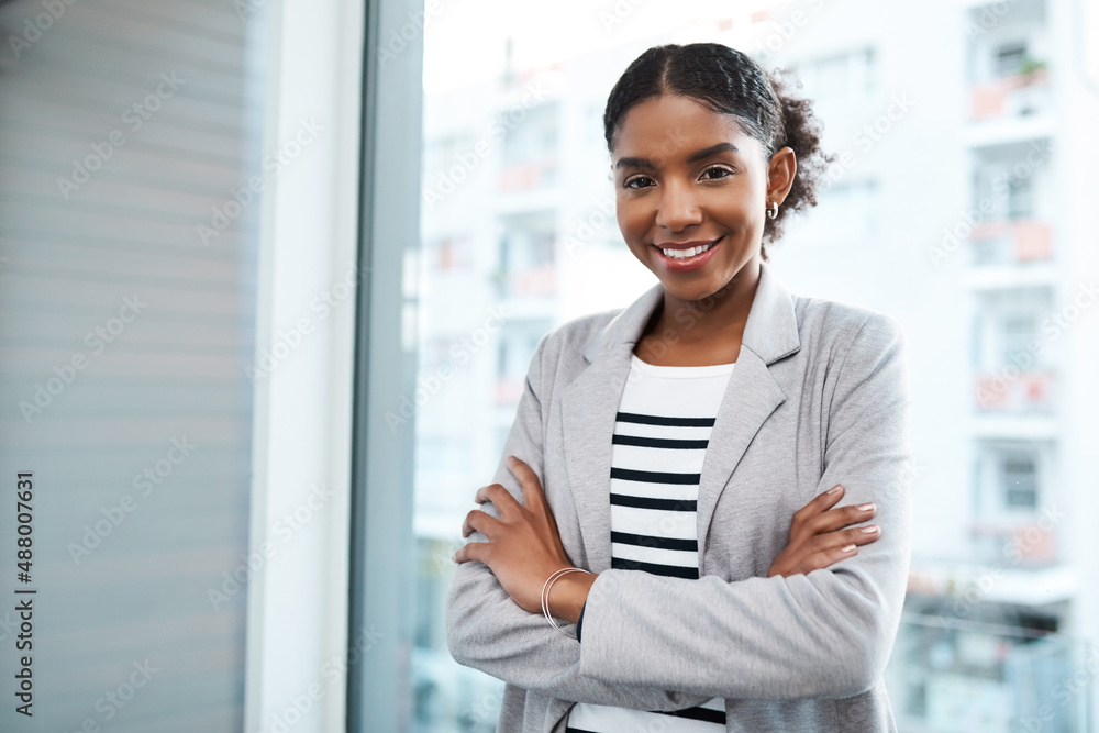Stand firm in the face of business. Portrait of a confident young businesswoman working in a modern office. Stand firm in the face of business. Portrait of a confident young businesswoman working in a modern office.