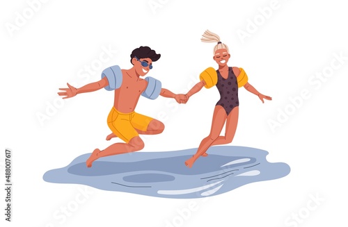Boy and girl jump into the sea. Young man and woman wearing inflatable swimming arm bands jumping in pool or sea water. Cheerful tourists flat vector characters, happy people having fun on vacation