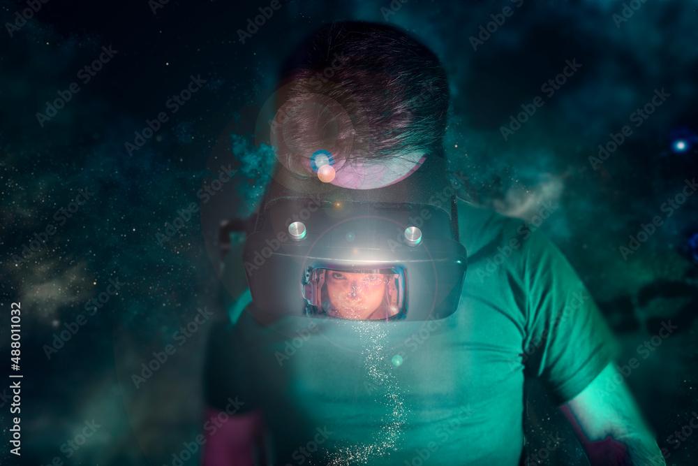 man with vr glasses in metaverse space interacting with woman on screen
