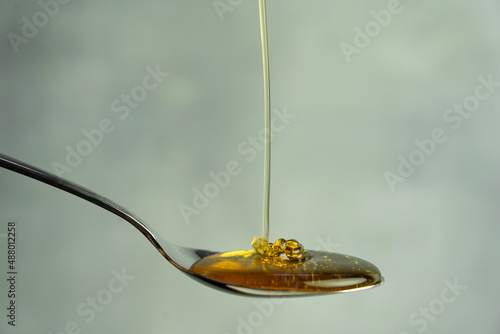 A spoon of organic honey