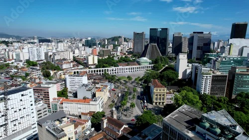 Panning wide view of downtown city of Rio de Janeiro Brazil. Tourism landmark. Offices buildings exterior and harbor zone near Guanabara bay.   photo