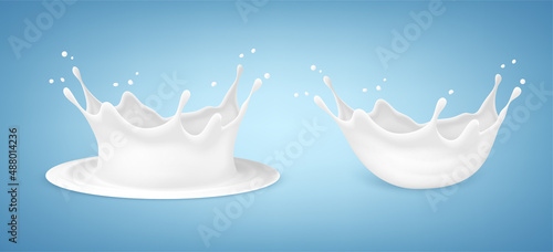 Milk crown splash set isolated on blue background. Vector realistic milk splash.