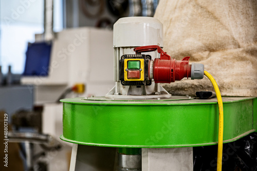 Machine with three phase power plug. Woodworking workshop equipment.