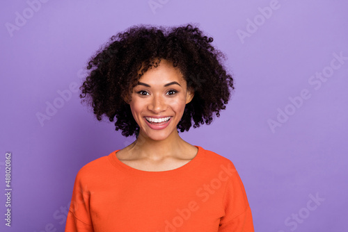 Photo of hooray millennial brunette lady wear orange t-shirt isolated on purple background.