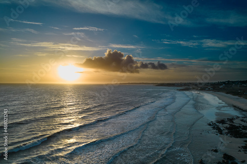 Sunset on french beach. Aerial view with drone in summer.