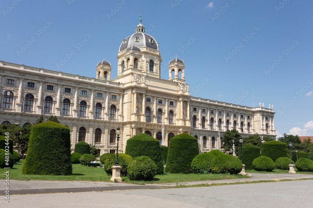 Garden and lampposts at Maria Theresien Platz town square with building of Naturhistorisches Museum Wien