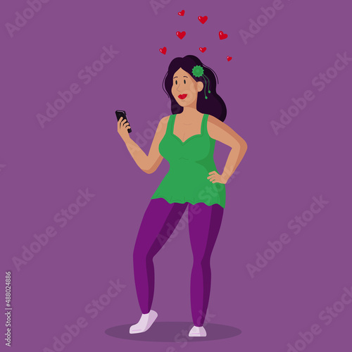 A girl in love sends an SMS via her smartphone.