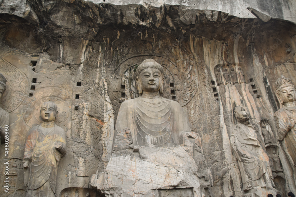 Buddha Statue Carving at Longmen Grottoes in Luoyang, Henan Province, China Buddha Statue Carving at Longmen Grottoes in Luoyang, Henan Province, China