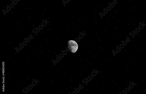 moon with stars around it, night photo