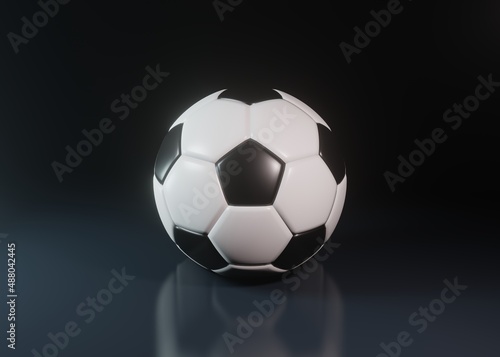 Soccer ball or football on a dark background with copy space in a conceptual image. 3d rendering illustration