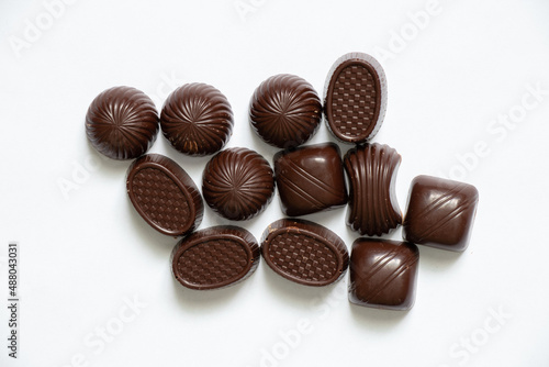 chocolate candies on a white background close up