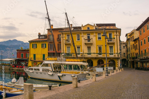 Winter at the historic waterfront of the small town of Malcesine on the north shore of lake Garda, Verona Province, Veneto, north east, Italy 