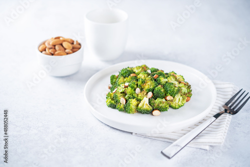 Roasted Broccoli with almond slices in a plate