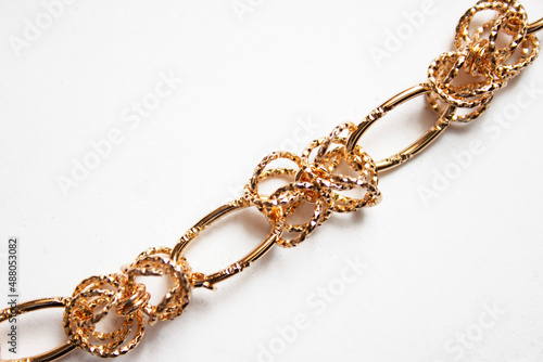 Gold jewelry chain necklace isolated on white