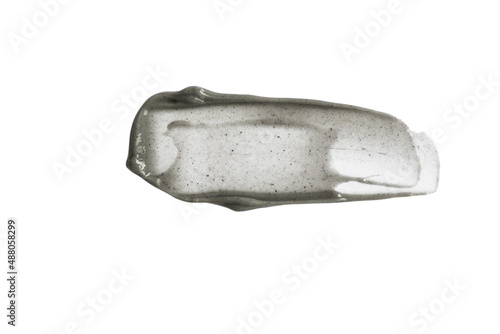 Black and gray smear with scrub effect, cream on a white background