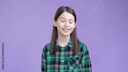Lovely kid girl look at camera smile isolated bright color background