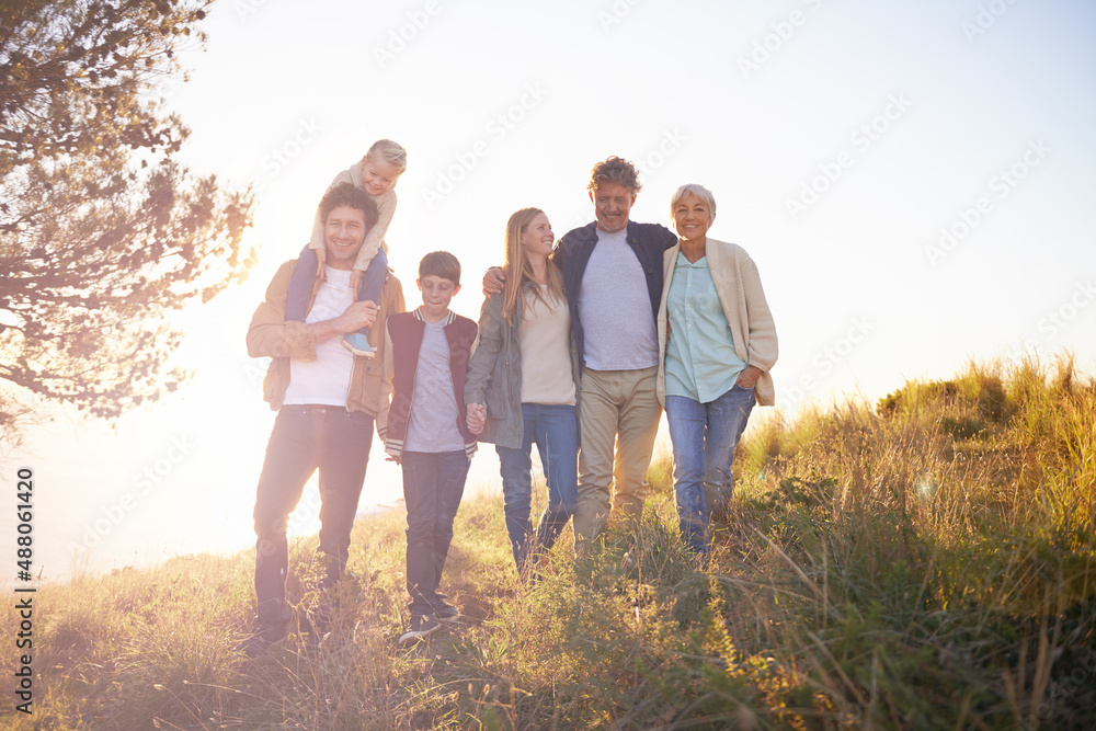 It was the perfect day for a family outing. Full length portrait of a happy multi-generational family on an afternoon walk.
