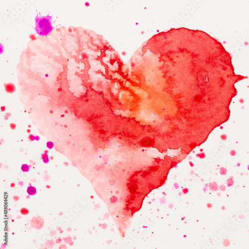 Watercolor painted pink heart, on the white watercolor paper.