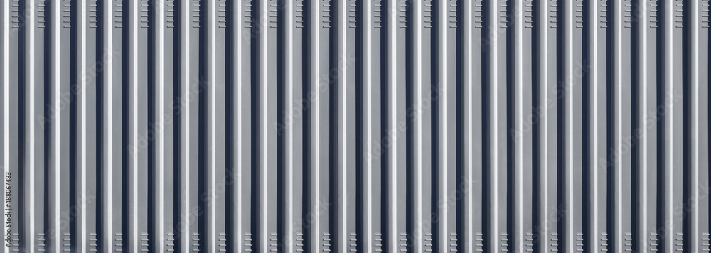 Modern striped aluminium façade in a house wall. Modern striped aluminium façade in a house wall.