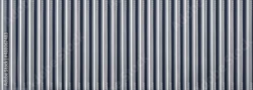 Modern striped aluminium façade in a house wall.