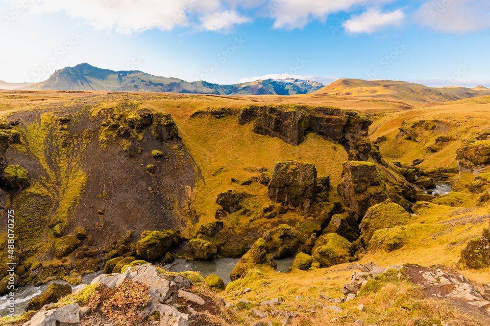 Obraz premium the Fimmvorduhals Trailhead to the canyon at Skogafoss waterfall on Iceland