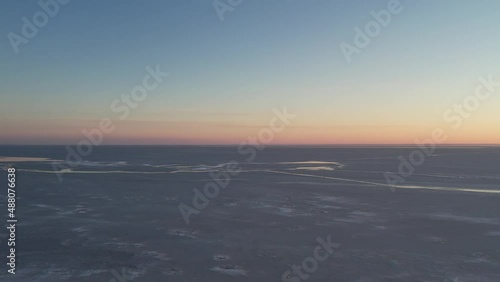 sunrise view of the frozen river