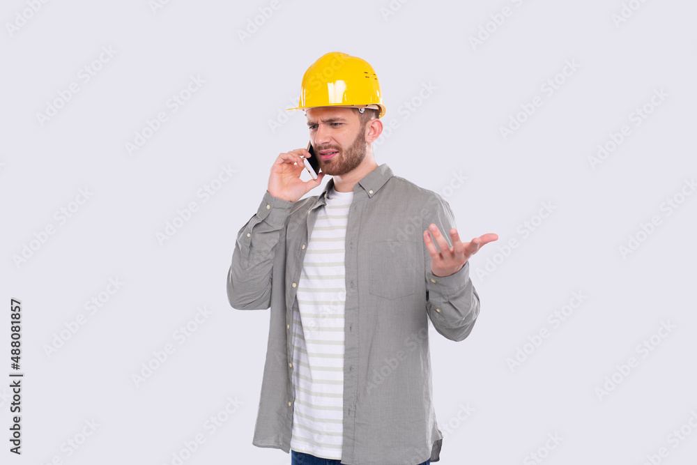 Construction Worker Talking on Phone Angry Standing Isolated. Commecial, Shopping, Advertisment Concept. Technology Construction Worker Talking on Phone Angry Standing Isolated. Commecial, Shopping, Advertisment Concept. Technology