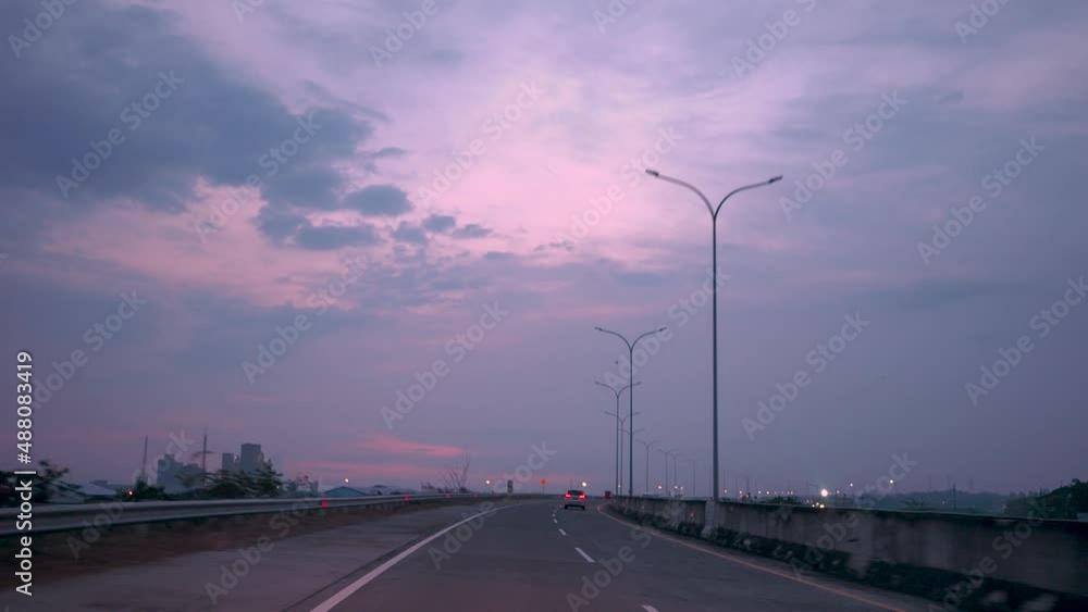 Enjoy the trip along the highway Indonesian toll road in the beautiful afternoon Enjoy the trip along the highway Indonesian toll road in the beautiful afternoon