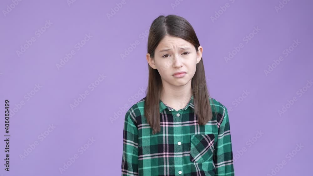 Upset kid forget friend birthday facepalm isolated vivid color background Upset kid forget friend birthday facepalm isolated vivid color background