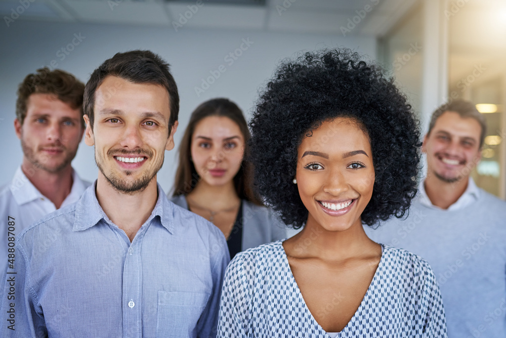 Confidence stands with this team. Portrait of a confident group of businesspeople standing in an office. Confidence stands with this team. Portrait of a confident group of businesspeople standing in an office.