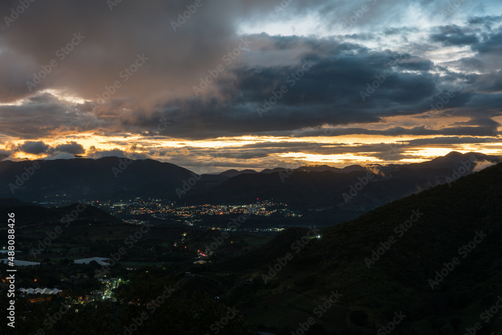 Dramatic sunset image of the small Caribbean mountain town of Ocoa, in the Dominican Republic. Dramatic sunset image of the small Caribbean mountain town of Ocoa, in the Dominican Republic.