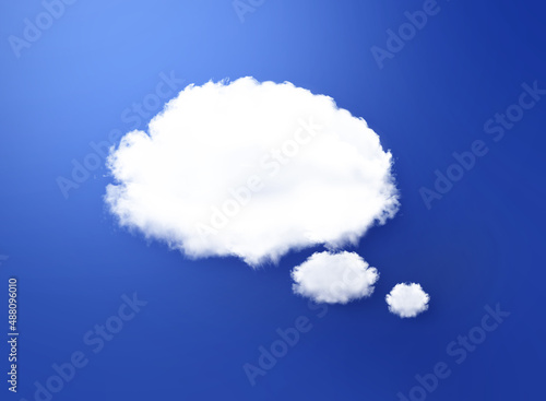 White cloud shape of a thinking balloon at 
blue background, concept communication.