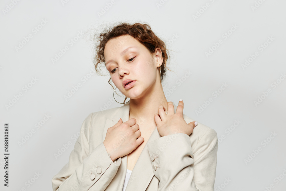 beautiful woman classic suit fashion posing fun light background unaltered beautiful woman classic suit fashion posing fun light background unaltered