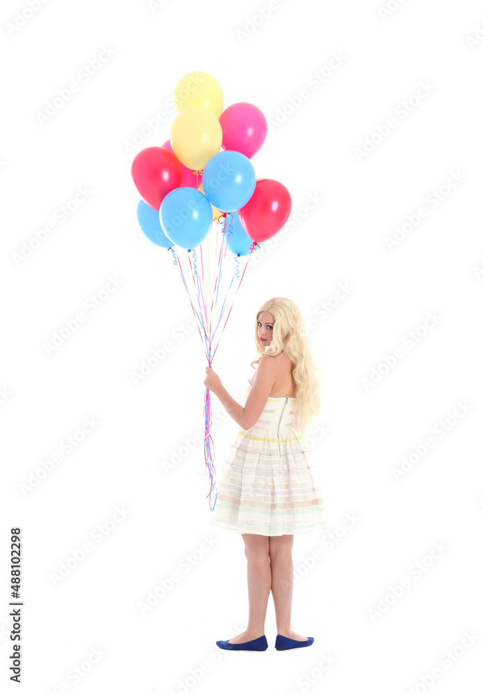 Full length portrait of blonde girl wearing party dress, holding bunch of colourful balloons. Isolated on white studio background
Full length portrait of blonde girl wearing party dress, holding bunch of colourful balloons. Isolated on white studio background