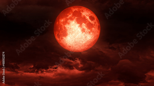 Creepy blood moon,red moon,The bloody full moon on the clouds.Horror moon 3D rendering