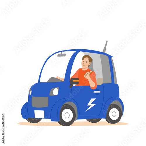 小型電気自動車を運転する男性 © MASAGAMI