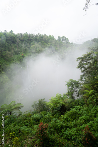 Clouds in Tumpak Sewu waterfall   Java  Indonesia