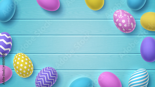 Volumetric painted 3D Easter eggs with pattern on blue wooden background. Bright vector illustration with place for text, copys pace. Colorful wallpaper for spring Christian holiday.