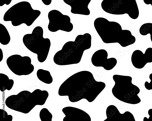 Cow black and white seamless pattern. Ideal for printing on wallpaper, fabric, packaging. Abstract vector spots. 
