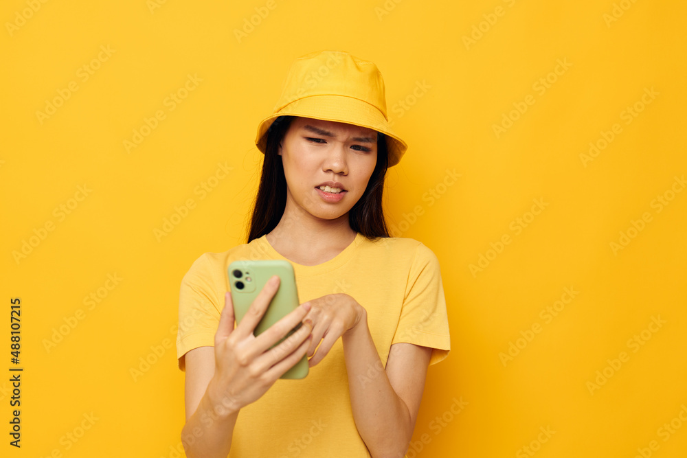 pretty brunette talking on the phone posing fashion isolated background unaltered pretty brunette talking on the phone posing fashion isolated background unaltered