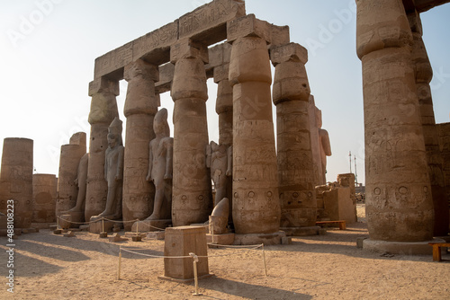 Columns and statues in the courtyard of Ramses II of the Luxor Temple. Luxor (destroyed Thebes). Egypt.