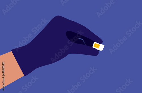 Hacker's Hand With Black Glove Stealing SIM Card Information.